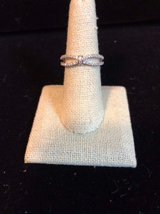 Sterling silver center tied CZ ring